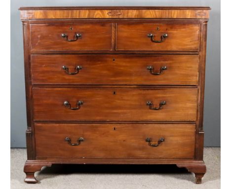 A George III "North Country" Mahogany Chest, with moulded edge to top, the frieze inlaid with oval fan paterae and shell moti