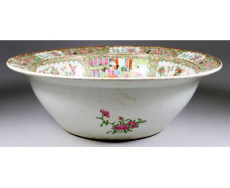 A Chinese "Cantonese" Porcelain Wash Basin, 19th Century, enamelled in colours and gilt with panels depicting figures on terr