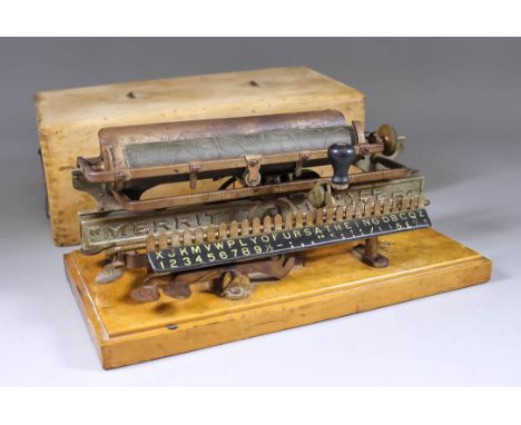 A Late 19th Century American Merritt "Linear Index Lined" Typewriter, No. 1234 7151, contained in wooden case, 12.25ins x 6in