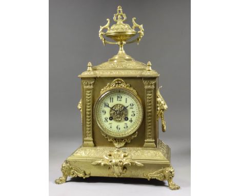 A Late 19th Century French Brass Cased Mantel Clock, the 3.75ins diameter cream enamel chapter ring with Arabic numerals, to 