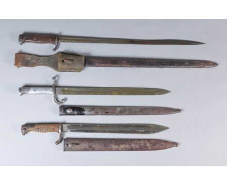 A German First World War Bayonet by Haenel, 21ins bright steel fluted blade with pipe back, hardwood grips, cross guards stam