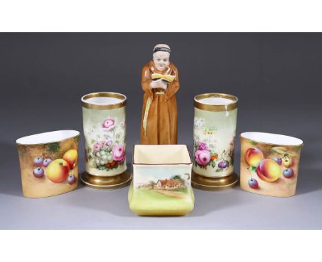 A Royal Worcester Porcelain Candle Snuffer, modelled in the form of a monk holding an open book, 4.75ins high, (printed mark 