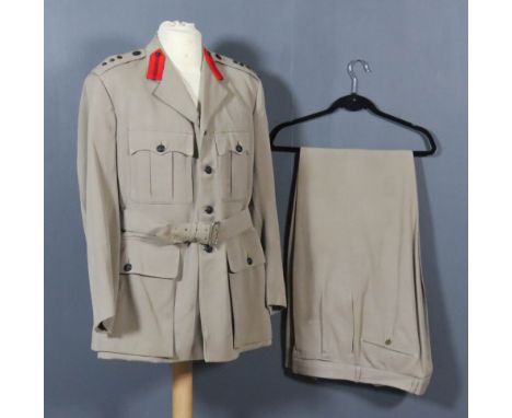 A Rifle Brigade Summer Uniform of Colonel D. M. R. Bright, 1959, with black buttons, Guelphic Crown insignia and Rifle Brigad
