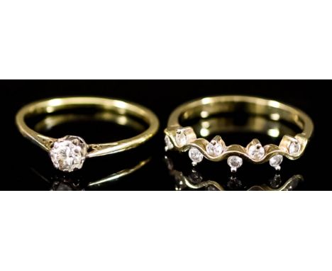 A Diamond Solitaire Ring, Modern, and a Diamond Eight Stone Ring, each in 18ct gold mounts, the solitaire ring set with diamo