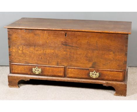 An 18th Century Oak Mule Chest, with plain top, fitted two drawers to base inlaid with crossbandings, on bracket feet, 43.5in