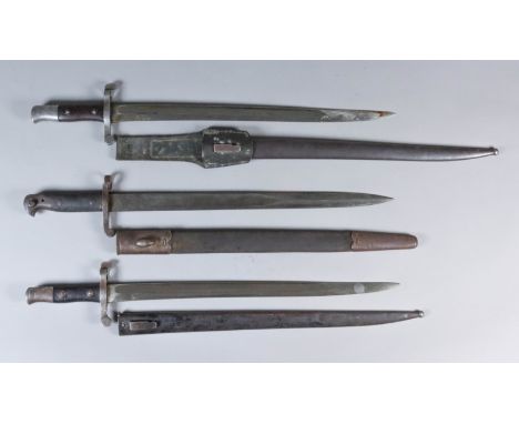 Three 19th Century British Bayonets, each with conforming scabbard, one with frog
