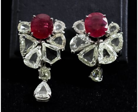 A Pair of Ruby and Diamond Earrings, Modern, in white coloured metal mount, for pierced ears and with clip fixings, each set 