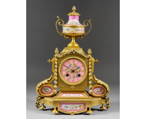 A 19th Century French Ormolu and Porcelain Mounted Mantel Clock, by Japy Freres, No. 46, the 3ins diameter porcelain dial wit