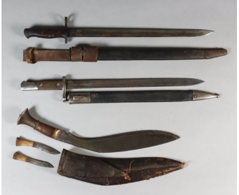 A Spanish 20th Century Bayonet by Artillery of Toledo, 15.5ins bright steel blade bearing makers name, brown hardwood chequer