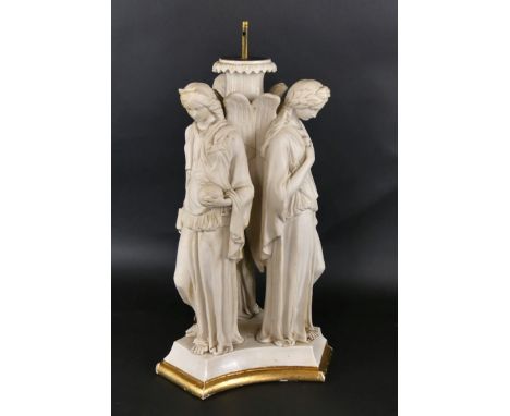 A large 19th Century Parianware table lamp baseFormed as three angels raised on a gilt highlighted plinth base, unsigned.   C