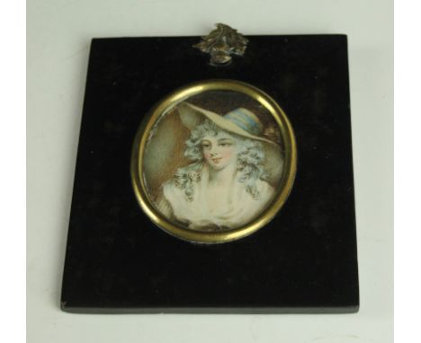 A 19th Century portrait miniature on ivoryDepicting a lady wearing a large hat with curly hair, inset within lacquered frame,