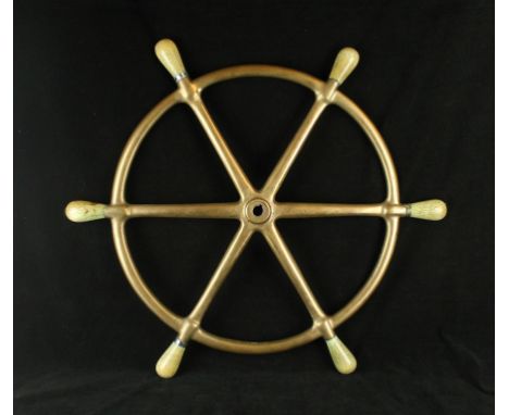 A 19th Century bronze ships wheelOf typical form having six whalebone terminals, diameter 65cm