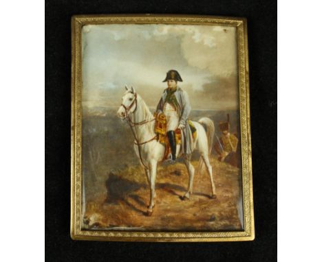 A portrait miniature circa 1900 depicting Napoleon on his horse Marengo In landscape scene, inset within gilt frame 8.5x6cm  