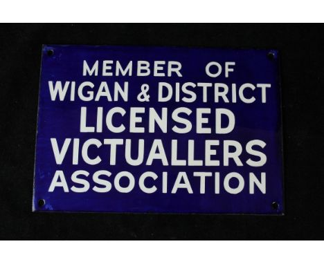 An original advertising enamel sign of rectangular form'Member of Wigan & District Licensed Victuallers Association' 18x25cm 