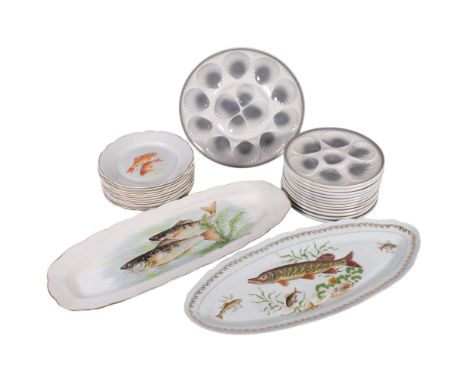 A set of Continental oyster plates, a Sarreguemines set of 12 fish plates and matching serving plate, and a Limoges salmon di