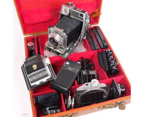 A fine quality Vintage Linhof Technika 5x4 camera, with a Zenotar 1:2,8/105 lens no. 3609831, and a large quantity of accesso