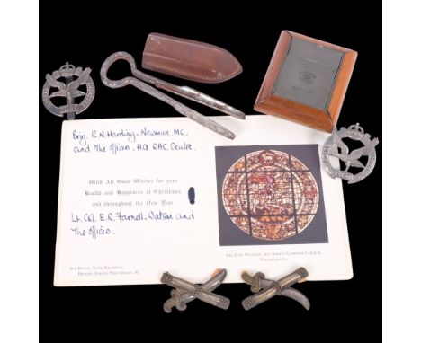 A collection of military memorabilia, including a De La Rue &amp; Co Officer's travelling inkwell, a pipe cleaning tool by Un