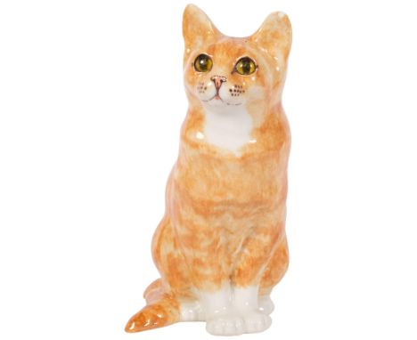 A large seated Winstanley ginger cat, overall height 33cm