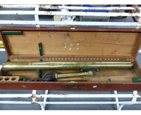 A MAHOGANY CASED BRASS SINGLE DRAW TELESCOPE WITH 7cms. LENS AND WITH ATTACHED TRIPOD, THE BARREL LENGTH.   105cms