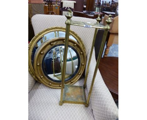 TWO SMALL WALL MIRRORS AND A BRASS STICK STAND. 