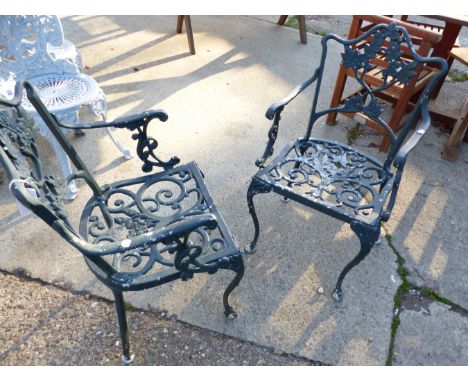 A PAIR OF CAST METAL GARDEN CHAIRS