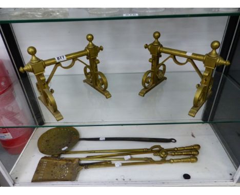 A PAIR OF BRASS FIRE DOGS, BRASS FIRE TOOLS, ETC. 