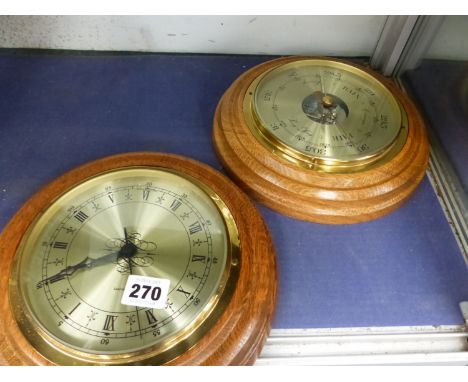 A WALL BAROMETER AND CLOCK 