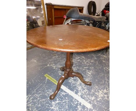 A GEORGE III MAHOGANY BIRDCAGE TRIPOD TABLE, THE CIRCULAR TOP ON A BALUSTER COLUMN AND LEGS WITH LONG NOSE CLUB FEET.&nbsp; &