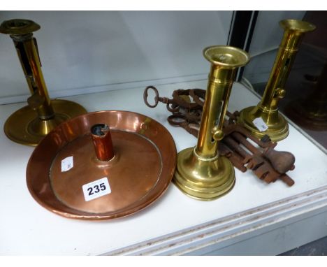 AN ARTS AND CRAFT COPPER CHAMBER STICK THREE BRASS CANDLE STICKS A CARTRIDGE MAKING TOOLS AND VARIOUS VINTAGE KEYS