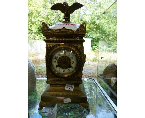 A BRASS MANTEL CLOCK THE MOVEMENT SIGNED AD . MOUGIN