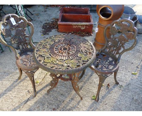 SMALL CAST IRON GARDEN TABLE AND TWO CHAIRS 