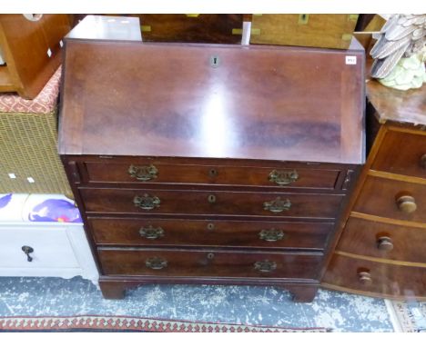 A GEORGE III MAHOGANY WRITING BUREAU WITH WELL FITTED STEPPED INTERIOR OVER FOUR DRAWERS ON BRACKET FEET. 