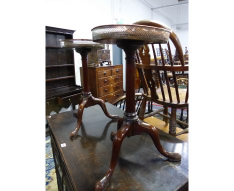 A PAIR OF MAHOGANY TRIPOD TABLES, THE CIRCULAR TOPS WITH COPPER GALLERIES, THE LEGS ON LONG NOSED CLUB FEET. Dia. 29 x H 56cm