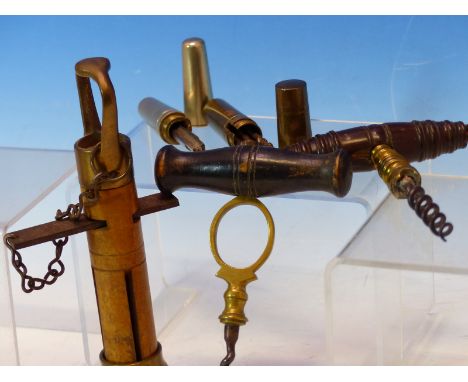 TWO 19th C. CORK SCREWS, A BRASS HANDLE UNSCREWING TO REVEAL A CORK SCREW AND THREE OTHER TOOLS, A NICKEL HANDLE WITH SCREW E
