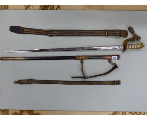 A GIEVES NAVAL OFFICERS SWORD, SCABBARD, BELT AND HANGER, A TASSELL HUNG FROM THE GUARD TO THE SHAGREEN HANDLE