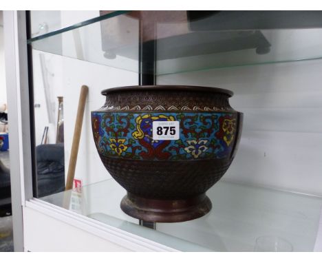 AN ORIENTAL BRONZE AND ENAMEL PLANTER.
