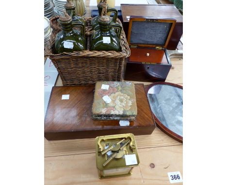 AN INLAID WOODEN HAND MIRROR, A CASED BOX OF COUNTERS, A BRASS CARRIAGE CLOCK, FOUR POTTERY DECANTERS WITH BLACK FOREST CARVE