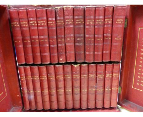 BOOKS - WALTER SCOTT, TWENTY FIVE RED LEATHER BOUND NOVELS, PUBLISHED BY BRADBURY, AGNEW &amp; CO. AND WITHIN A LEATHER MOUNT