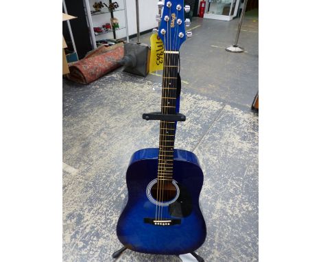 A STAGG BLUE ACOUSTIC GUITAR WITH A STAGG STAND