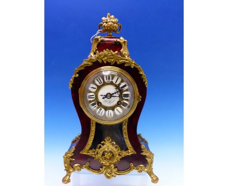 AN ORMOLU MOUNTED TORTOISESHELL CASED HENRI MARC BALLOON SHAPED MANTEL CLOCK STRIKING ON A COILED ROD, THE DIAL WITH ENAMEL N