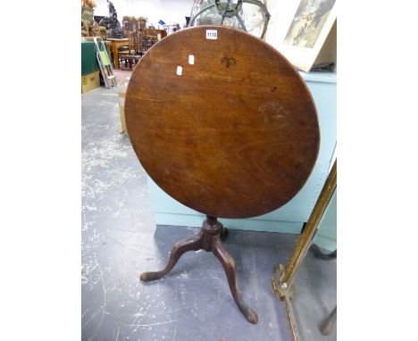 A GEORGE III MAHOGANY TILT TOP TRIPOD TABLE, THE CIRCULAR TOP ON BALUSTER COLUMN AND LEGS WITH LONG NOSE CLUB FEET.&nbsp; &nb