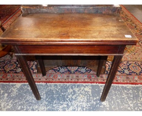 A GEORGE III MAHOGANY TEA TABLE, THE RECTANGULAR TOP OPENING ON SINGLE GATE ABOVE CHANNELLED SQUARE SECTIONED LEGS.   W 76 x 