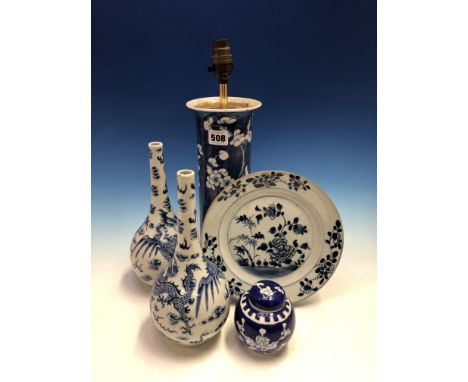 A PAIR OF CHINESE BLUE AND WHITE BOTTLE VASES PAINTED WITH DRAGONS AND PHOENIX, TWO CHARACTER MARKS.   H 26.5cms. A GINGER JA