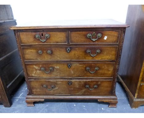 AN 18th C. MAHOGANY CHEST OF TWO SHORT AND THREE GRADED LONG DRAWERS BETWEEN GOTHIC BLIND FRET CORNERS AND ABOVE SHAPED BRACK