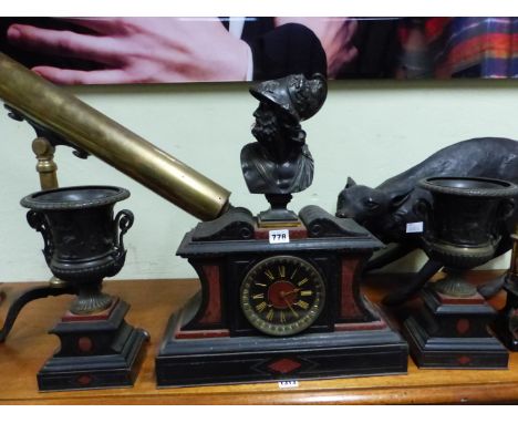 A 19th C. GRAND TOUR CLOCK GARNITURE, THE RED STONE ORNAMENTED BLACK SLATE CLOCK CASE SURMOUNTED BY A BRONZE BUST OF A CLASSI