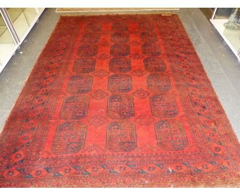 AN AFGHAN BOKHARA CARPET, 295 x 203cms