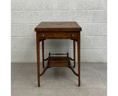 A 19th century rosewood envelope card table having a square marquetry inlaid and satinwood strung top with four hinged fold o
