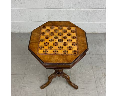 A 19th century walnut trumpet form work table with hinged chessboard inlaid top revealing fitted interior. H.78 W.45 D.45cm 