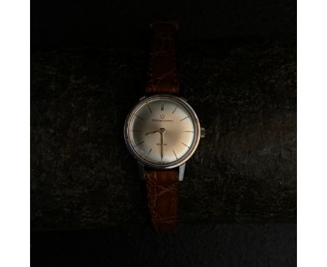 A 20th century Swiss Eterna-Matic Sahida ladies watch having a silvered dial in a steel case with a genuine crocodile skin st