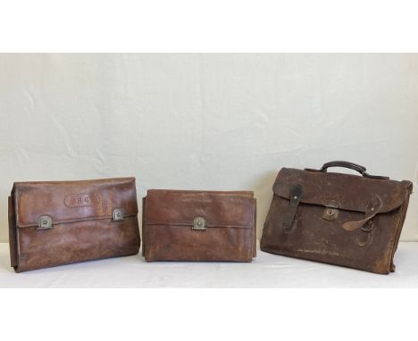 A collection of three early 20th century leather satchels to include two fitted with medical implements belonging to Colonel 
